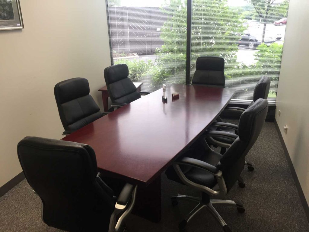 Conference room seating up to six at Lake Cook Reporting, court reporters and more in Chicago, IL.